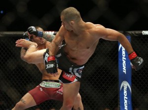 Renan Barão nocauteia Eddie Wineland e permanece com o cinturão no UFC 165